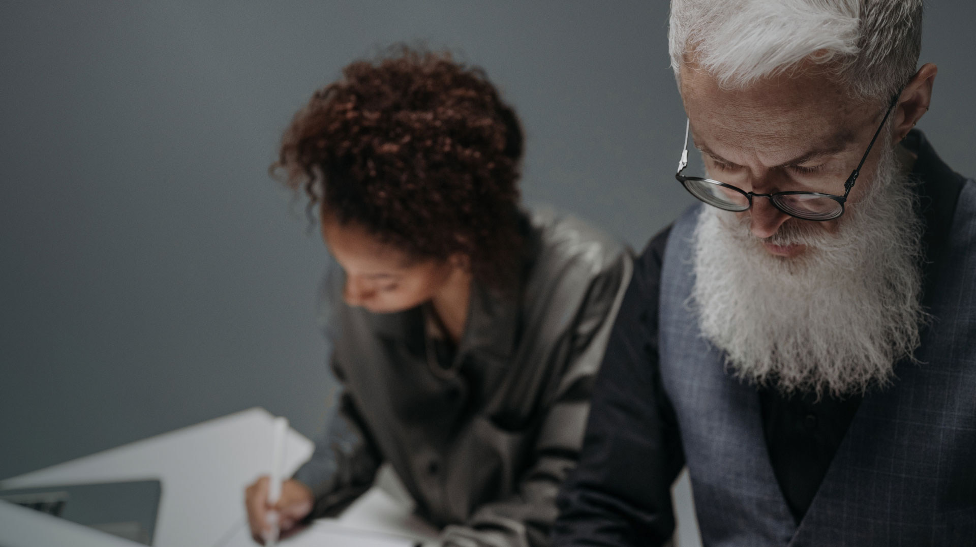 Two people engaged in discussion.
