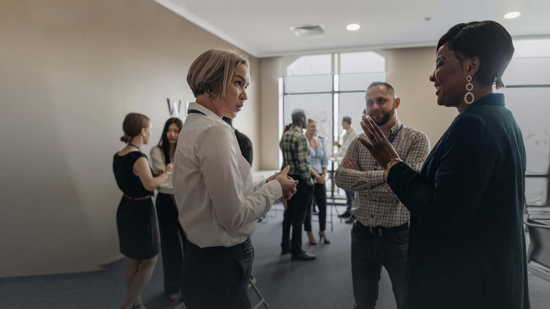 Group of people engaged in conversation.